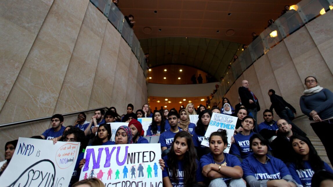 In this file photo of Feb. 29, 2012, New York University students, faculty and clergy gather on the NYU campus to discuss the recent discovery of surveillance by the New York Police Department on Muslim communities. (AP Photo/Craig Ruttle, File)