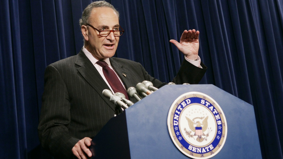 Sen. Charles Schumer, D-N.Y., gestures during a Capitol Hill news conference Tuesday, June, 13, 2006. Schumer recently proposed legislation that would tax U.S. expatriates. (AP Photo/Evan Vucci)