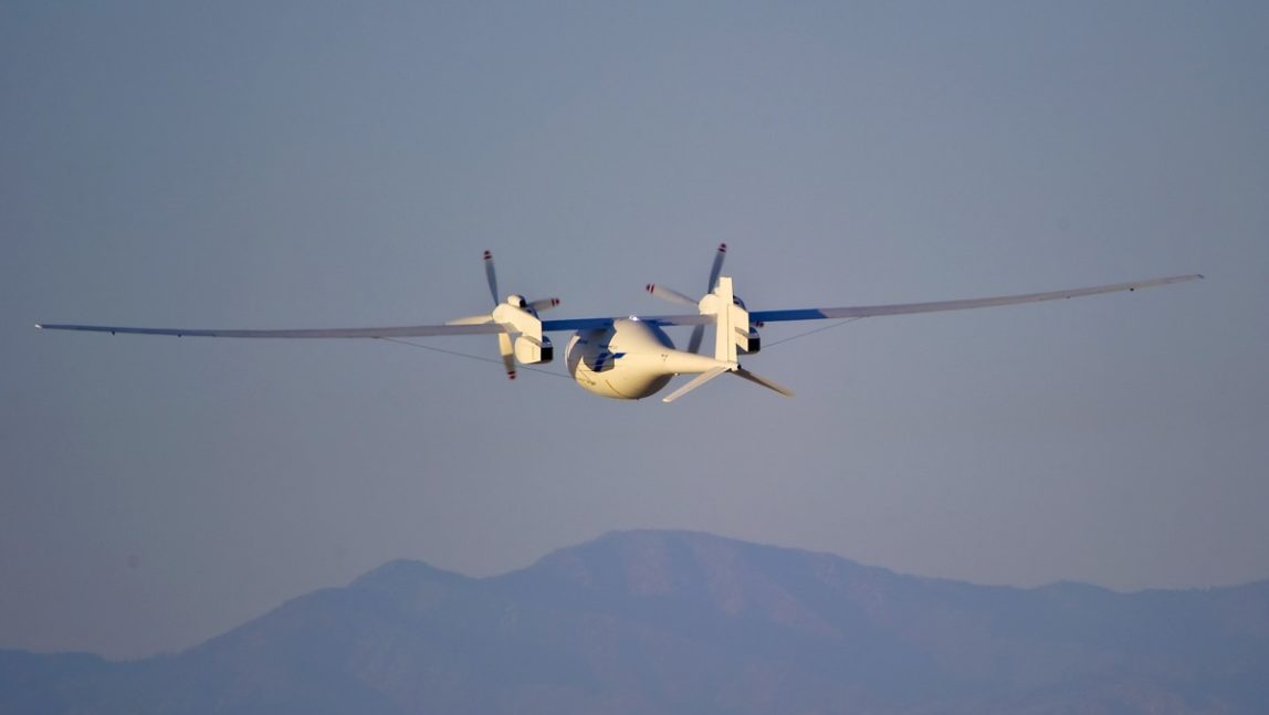In this June 1, 2012 photo provided by Boeing, the new Boeing Phantom Eye unmanned drone, designed to stay airborne for days, travels on its first autonomous flight at the NASA Dryden Flight Research Center at Edwards Air Force Base, Calif. (AP Photo/Boeing, Robert Ferguson)