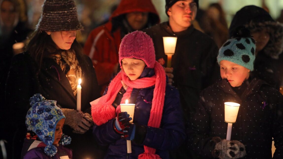 Friends, colleagues and supporters attend a vigil in memory of six year-old, Ana Marquez-Greene, a victim of the mass shooting in Newtown, Conn., on Monday Dec. 17, 2012. (AP Photo/The Canadian Press, Trevor Hagan)
