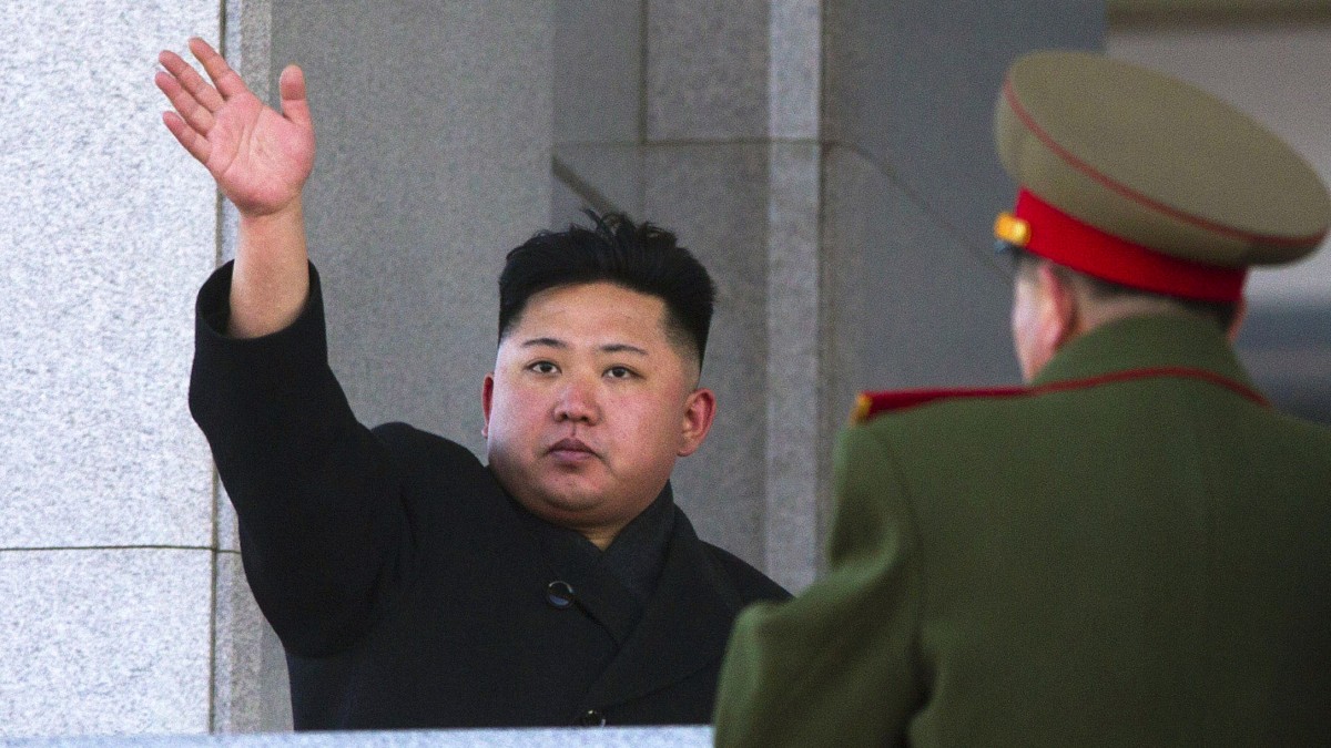 North Korean leader Kim Jong Un waves at Kumsusan Memorial Palace in Pyongyang after reviewing a parade of thousands of soldiers and commemorating the 70th birthday of his late father Kim Jong Il on Thursday, Feb. 16, 2012. (AP Photo/David Guttenfelder)