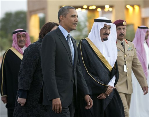 Saudi Arabia's Crown Prince Salman bin Abdulaziz Al Saud, escort President Barack Obama to his meeting with Saudi King Abdullah at Rawdat Khuraim, Saudi Arabia, Friday, March 28, 2014. Rawdat Khuraim is a green oasis located 62 miles northwest of the capital city of Riyadh and King Abdullah's private desert encampment is located within Rawdat Khuraim. (AP Photo/Pablo Martinez Monsivais)