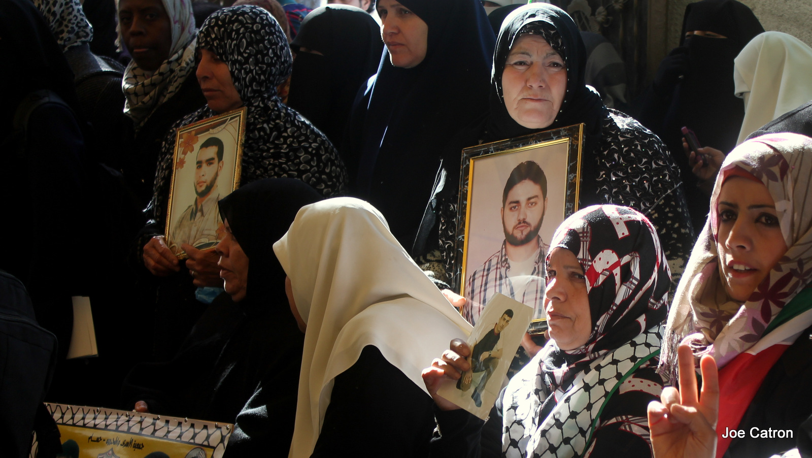 Women participate in a sit-in, held weekly by families of Palestinians detained by Israel in the courtyard of the International Committee of the Red Cross (ICRC)'s Gaza Strip headquarters.