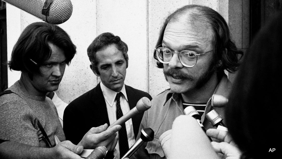 Anthony J. Russo leaves a Los Angeles federal courthouse on Oct. 1, 1971 after the court released him from jail on his promise to appear later before a federal Grand Jury investigating the leak of the so-called Pentagon Papers. Ellsberg is in left background.