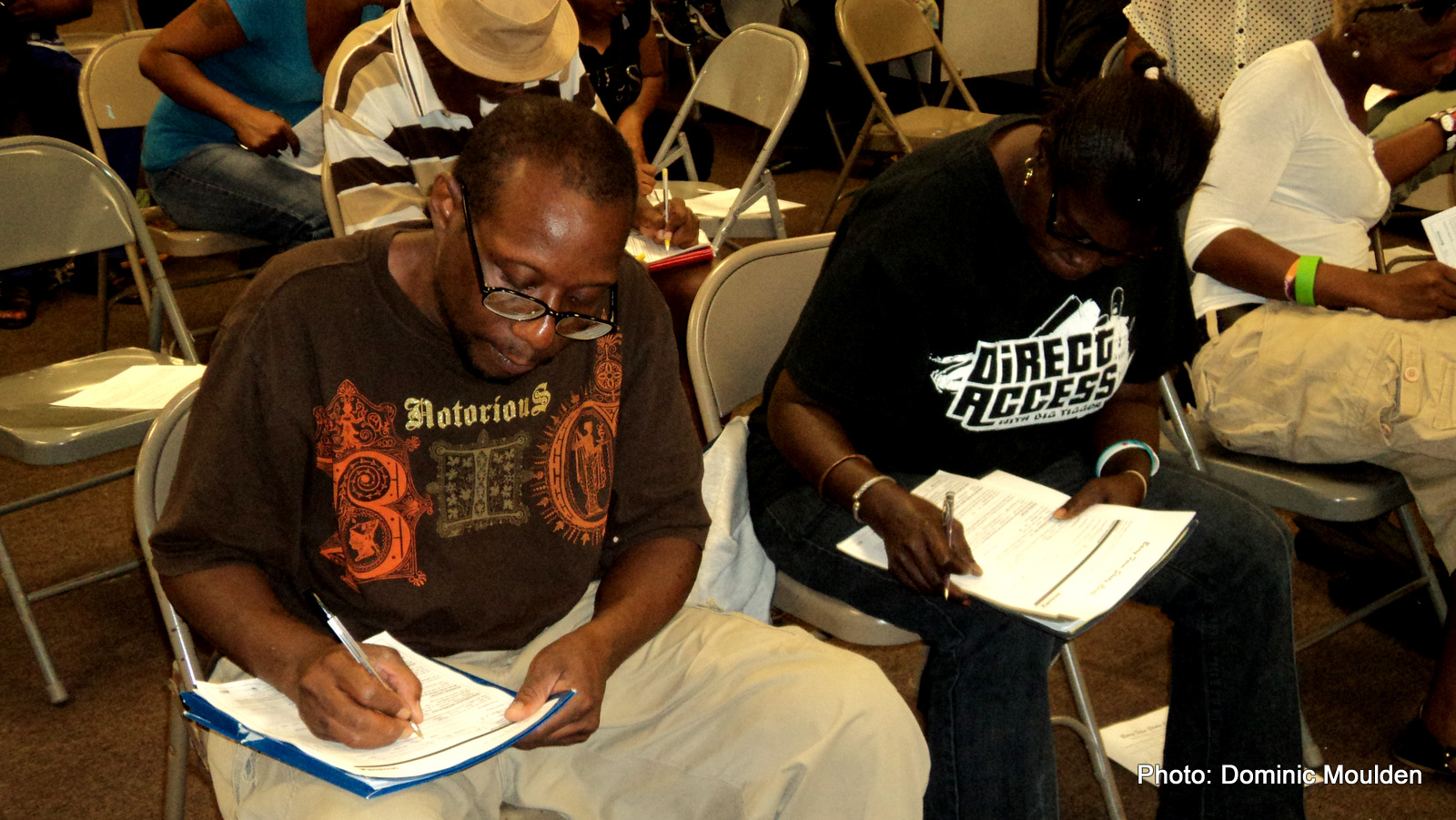 ONE DC organizers doing outreach to Barry Farm public housing residents for the Marriott Marquis Jobs Training Program 