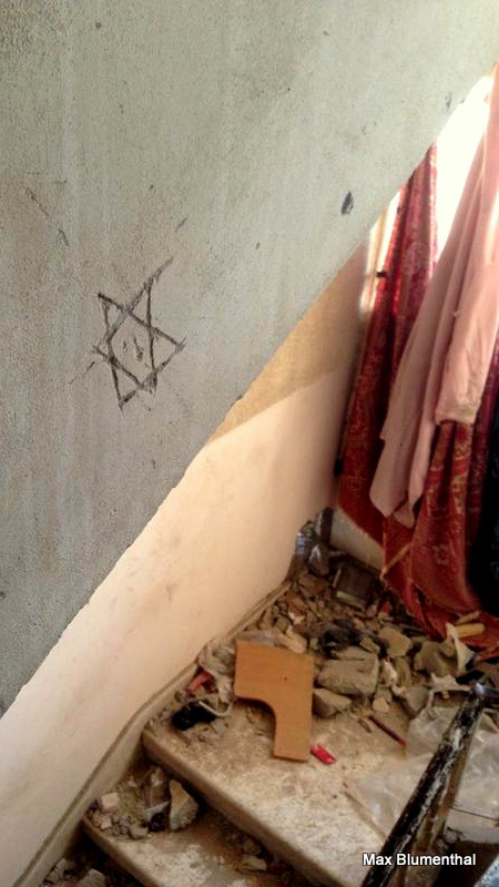 Soldiers carved Stars of David into homes in Shujaiya, Gaza Strip.