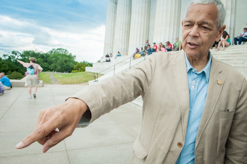 Julian Bond points at something off camera, photographed on location at the Lincoln Memorial during the filming of the documentary "Julian Bond: Reflections from the Frontlines of the Civil Rights Movement" on June 6, 2012. (Wikimedia Commons / Eduardo Montes-Bradley)