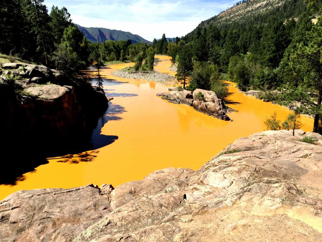 08/06/15-Durango - Mine waste from the Gold King Mine north of Silverton fills the Animas River at Bakers Bridge on Thursday morning. Photo: Jerry McBride/Durango Herald