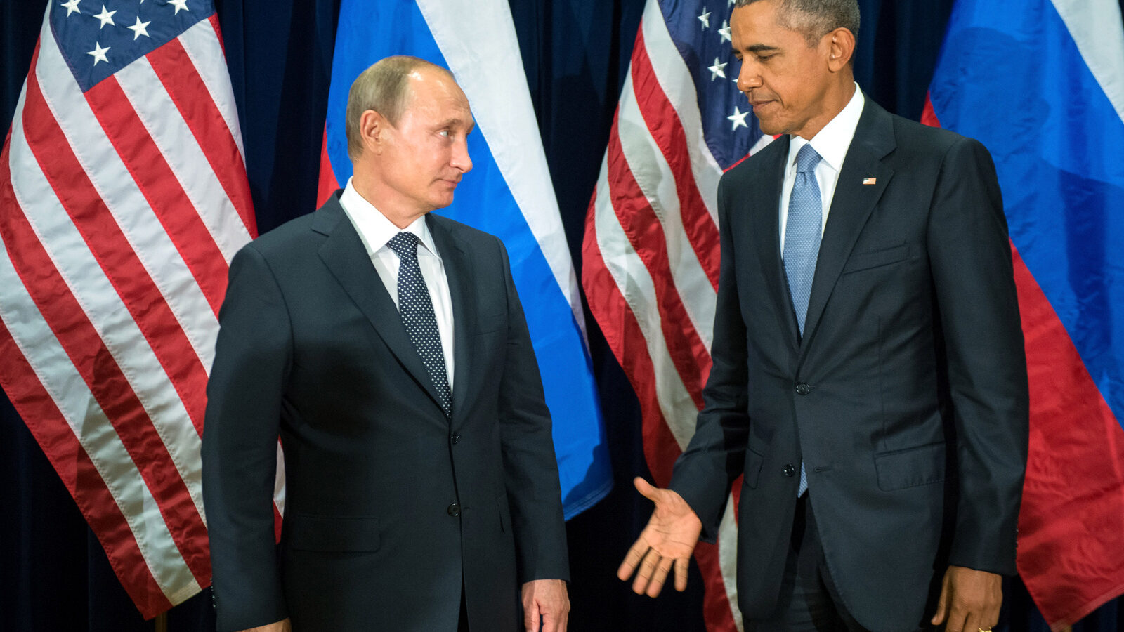 U.S. President Barack Obama, right, and Russia's President Vladimir Putin pose for members of the media before a bilateral meeting Monday, Sept. 28, 2015, at United Nations headquarters. (Sergey Guneyev/RIA-Novosti, Kremlin Pool Photo via AP)