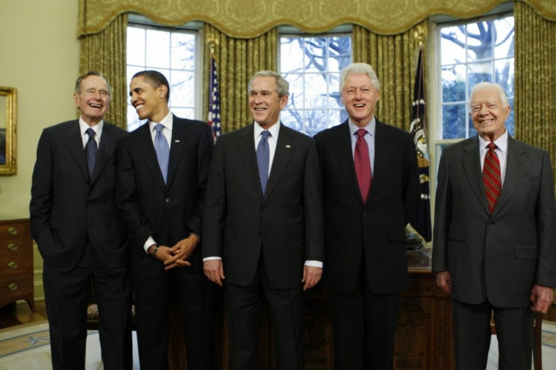 President-elect Barack Obama is welcomed by President George W. Bush for a meeting at the White House in Washington on Jan. 7, 2009, with former presidents George H.W. Bush, Bill Clinton and Jimmy Carter. (J. Scott Applewhite/AP)