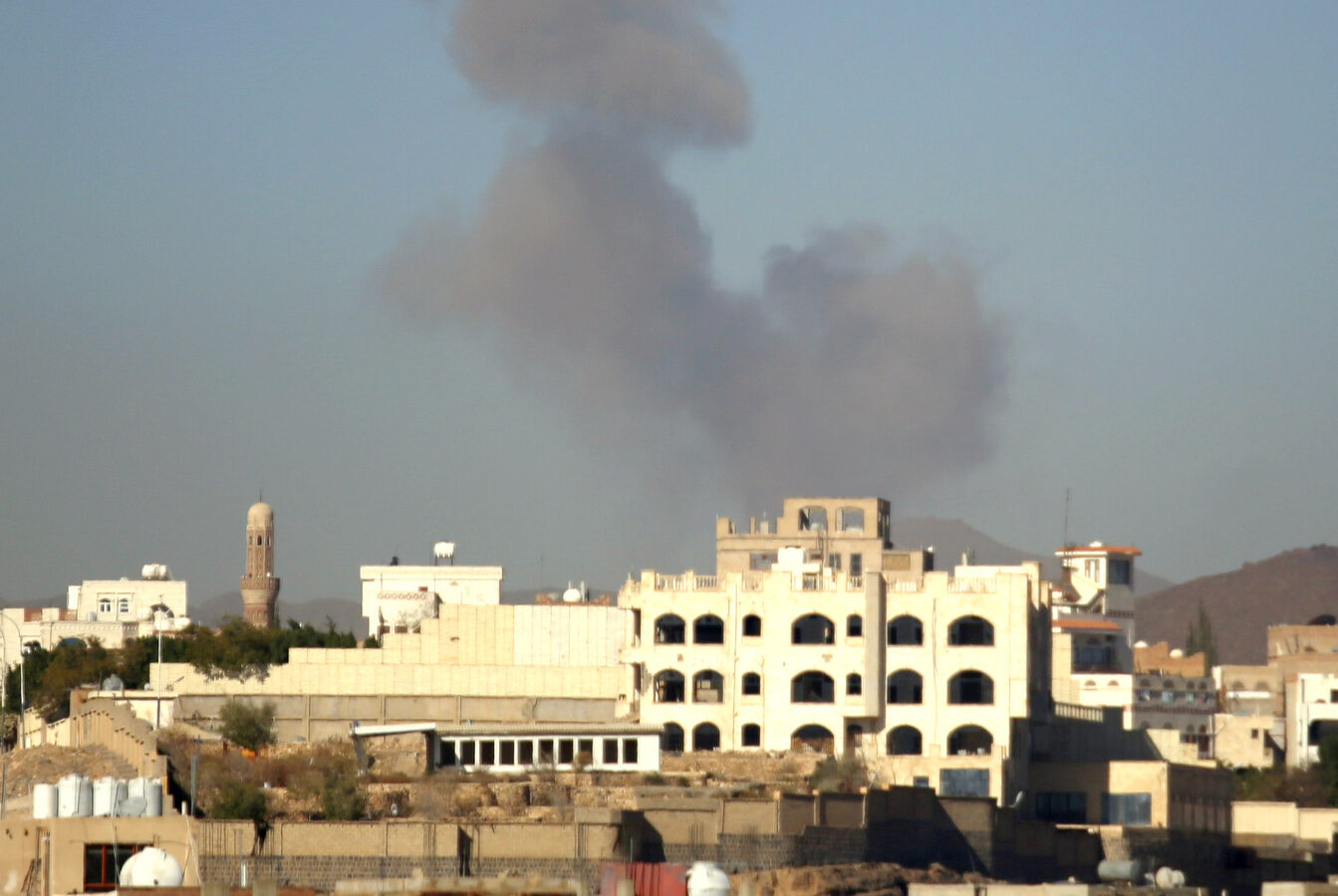 Smoke rises after a Saudi-led airstrike hits an army base in Sanaa, Yemen, Saturday, Dec. 5, 2015. (AP Photo/Hani Mohammed)