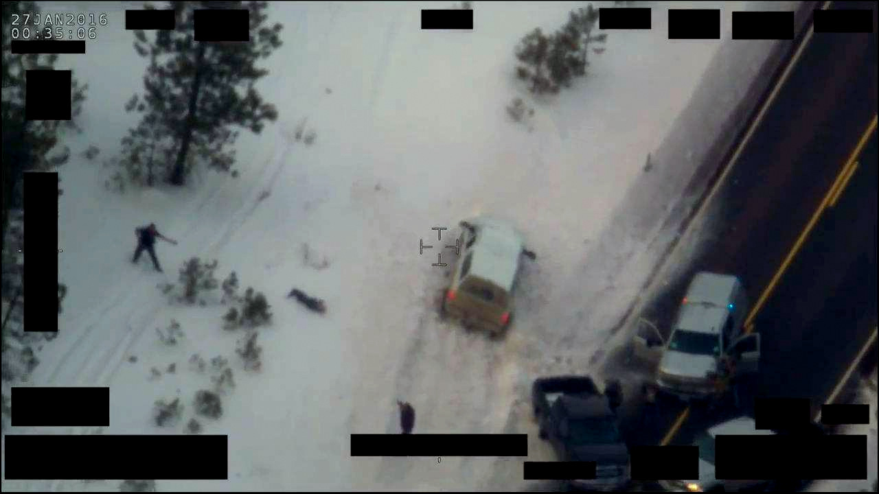 LaVoy Finicum lays dead in the snow after being shot and killed by police in Burns, Oregon.
