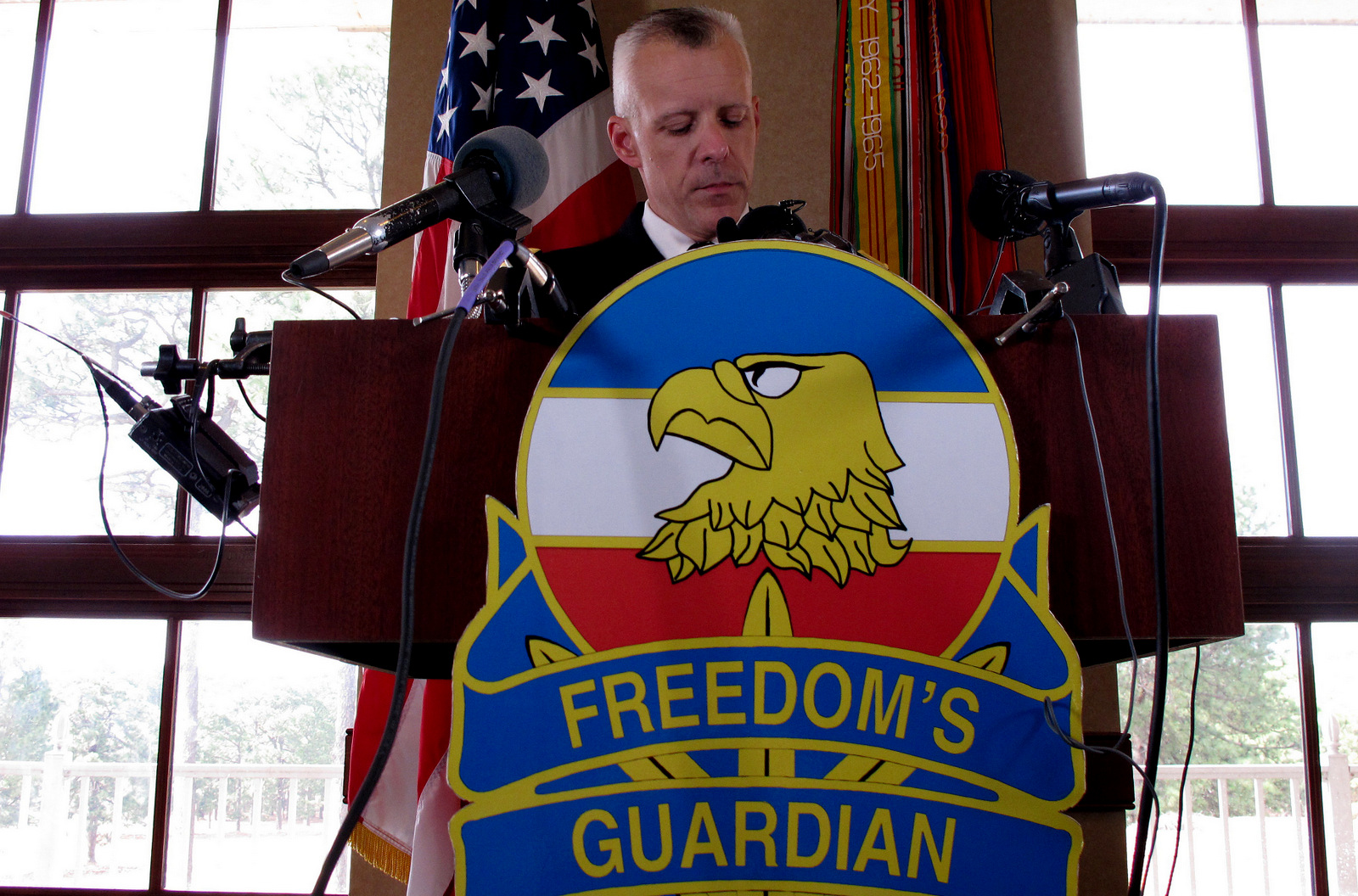 U.S. Army Col. Daniel King addresses the news media about charges against Army Sgt. Bowe Bergdahl at Fort Bragg, N.C., on Wednesday, March 25, 2015. Bergdahl, who abandoned his post in Afghanistan and was held captive for five years by the Taliban, was charged Wednesday by the U.S. military with desertion and misbehavior before the enemy and could get life in prison if convicted. (AP Photo/Allen G. Breed)