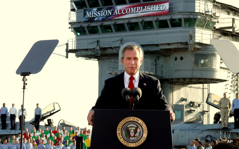 President Bush declares the end of major combat in Iraq as he speaks aboard the aircraft carrier USS Abraham Lincoln off the California coast, in this May 1, 2003 file photo. (AP/J. Scott Applewhite)