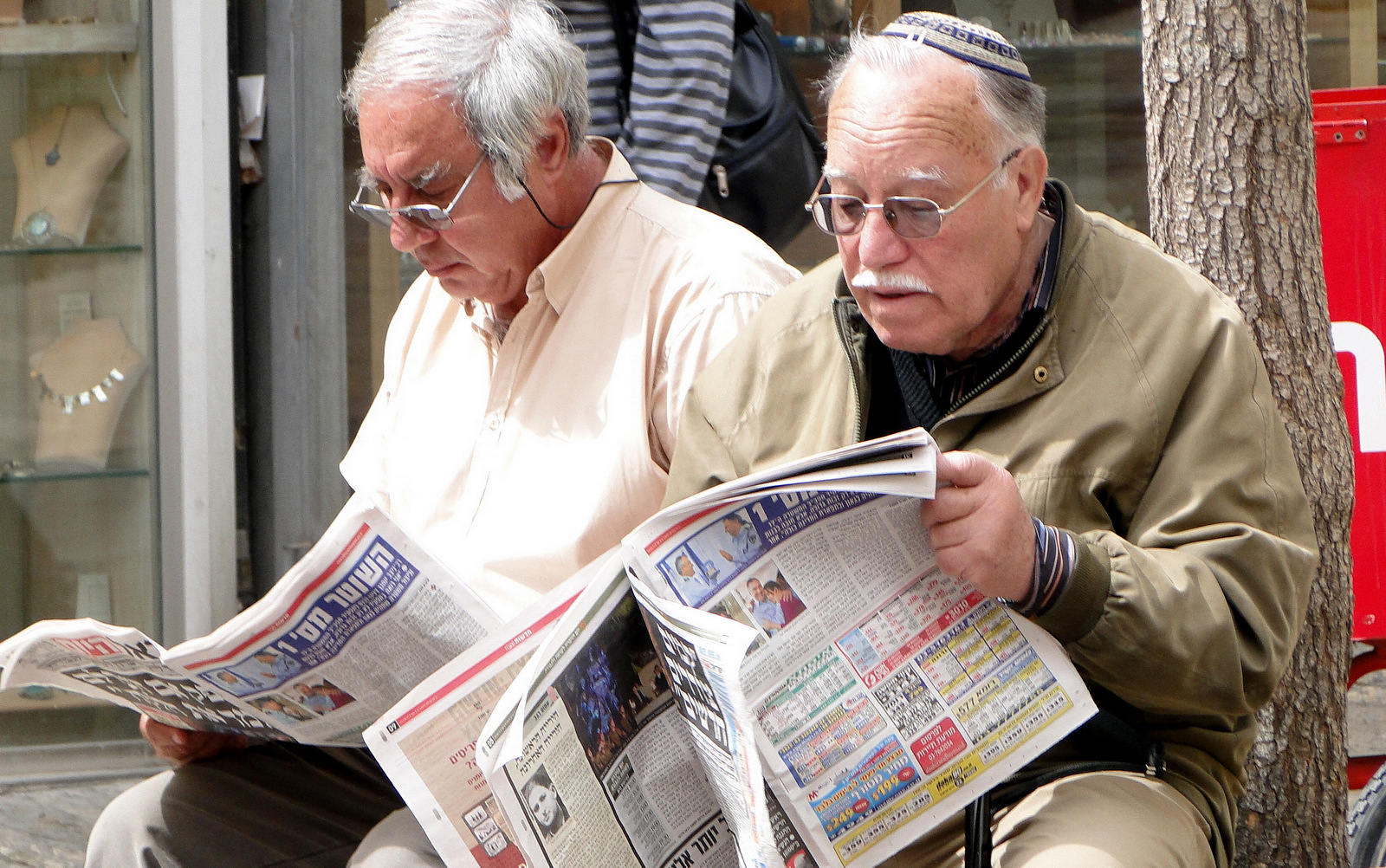 Israeli's read the morning paper on Ben Yehuda Street. Israel’s new military censor, Col. Ariella Ben Avraham, has mandated expanded monitoring and censorship of Israeli media, requiring social media activists and bloggers to have 'security related content' vetted by the government.
