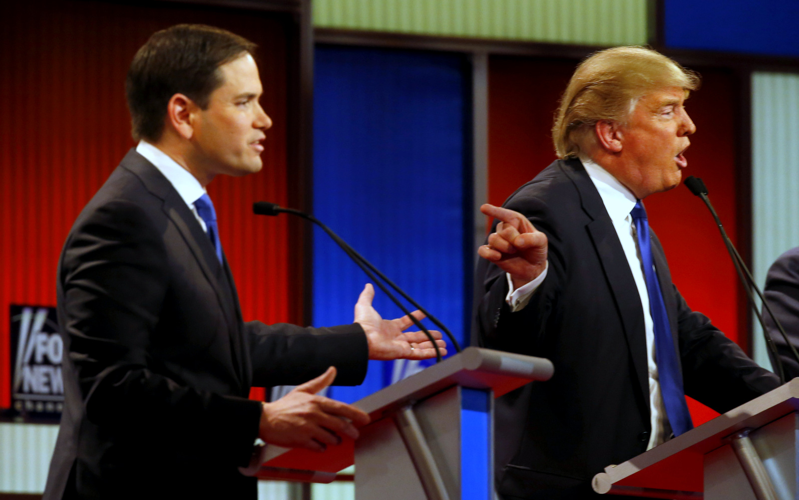 Republican presidential candidates, Sen. Marco Rubio, R-Fla., and businessman Donald Trump argue during a Republican presidential primary debate at Fox Theatre, Thursday, March 3, 2016, in Detroit. (AP Photo/Paul Sancya)
