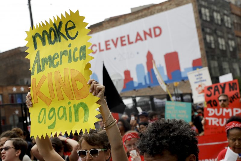 Protestors march during a rally against Republican presidential candidate Donald Trump on Monday, July 18, 2016, in Cleveland. (AP Photo/Patrick Semansky)