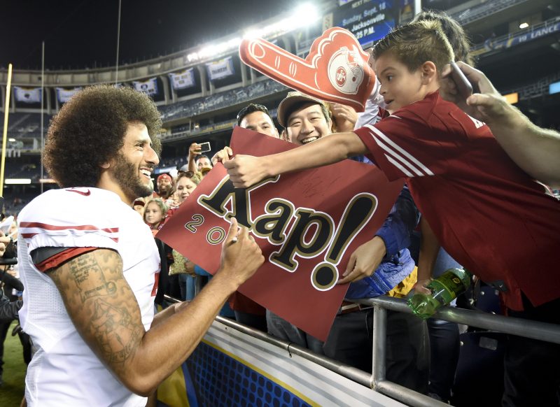 San Francisco 49ers quarterback Colin Kaepernick greets fans after their 31-21 win against the San Diego Chargers during an NFL preseason football game Thursday, Sept. 1, 2016, in San Diego.  (AP Photo/Denis Poroy)