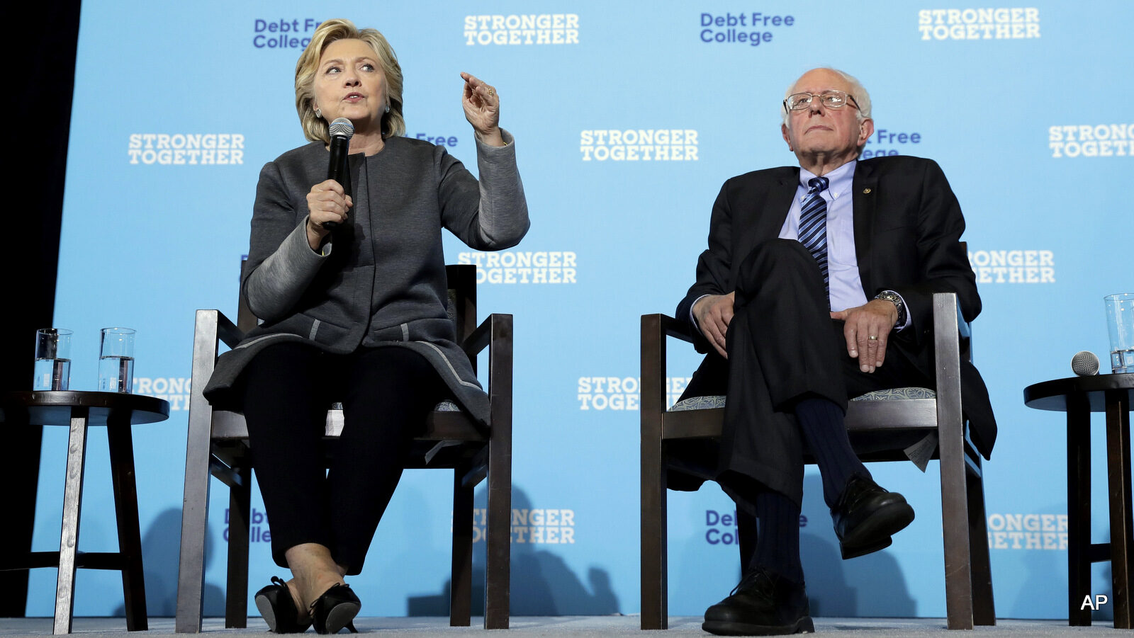 Democratic presidential candidate Hillary Clinton and Sen. Bernie Sanders, I-Vt. participate in a panel discussion during a campaign stop at the University Of New Hampshire in Durham, N.H., Wednesday, Sept. 28, 2016.