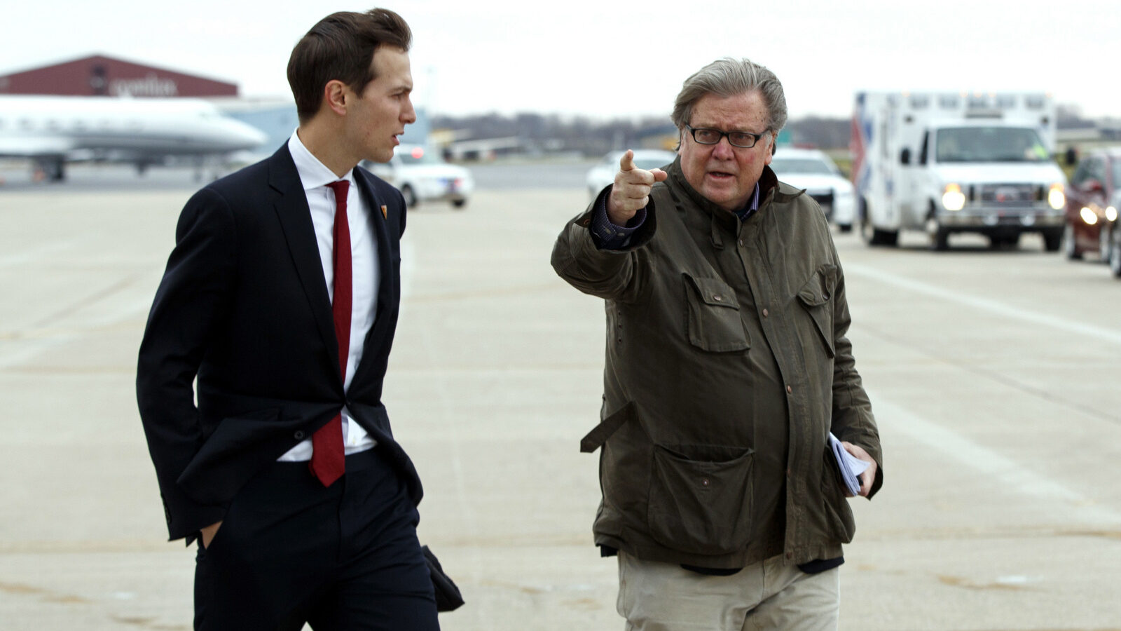 Jared Kushner, son in-law of President-elect Donald Trump, left, walks with Trump's Chief Strategist Stephen Bannon at Indianapolis International Airport, Thursday, Dec. 1, 2016, in Indianapolis, Ind. (AP Photo/Evan Vucci)