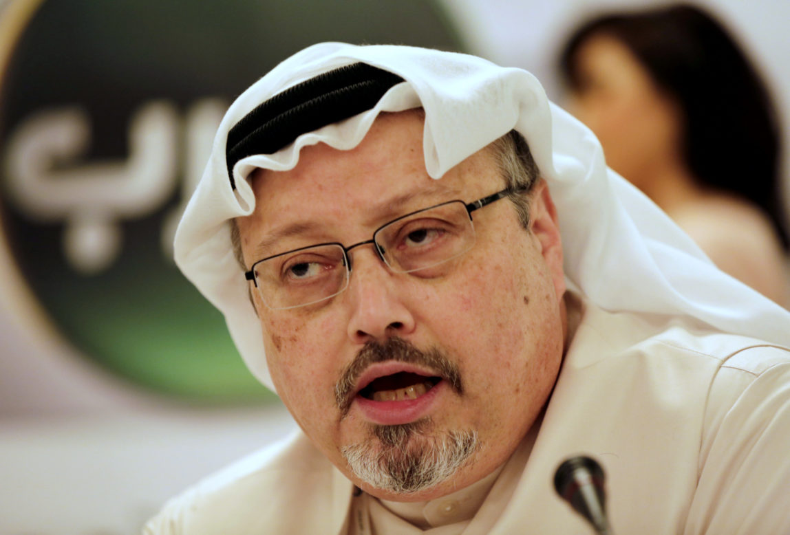 Jamal Khashoggi speaks during a press conference in Manama, Bahrain, Monday, Dec. 15, 2014. Khashoggi was recently banned from reporting by the Saudi government over his public criticism of Donald Trump. (AP Photo/Hasan Jamali)