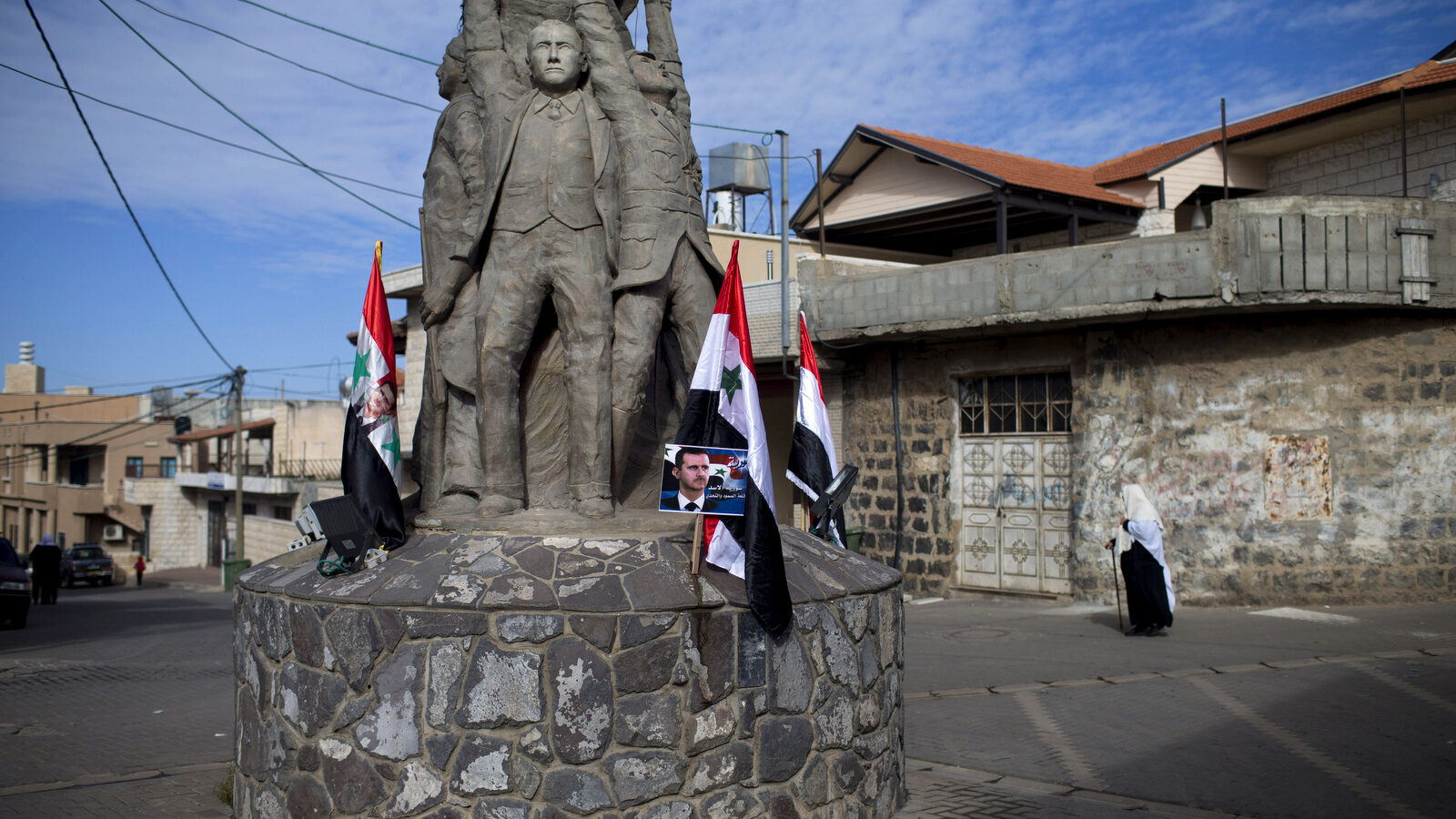 Druse participate in a rally, demanding the return of the Golan Heights, taken by Israel in 1967, close to the Syrian border in Buqata in the Golan Heights, Sunday, Feb. 14, 2016. The annual demonstration is in protest of the 1981 Israeli law in which the Jewish state annexed the strategic plateau it captured from Syria during 1967 Arab-Israeli war. (AP/Oded Balilty)