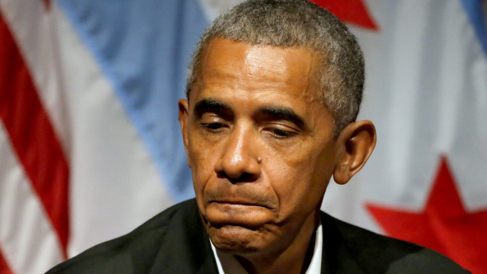 Former President Barack Obama pauses as he hosts a conversation on civic engagement and community organizing, April 24, 2017, at the University of Chicago. (AP/Charles Rex Arbogast)