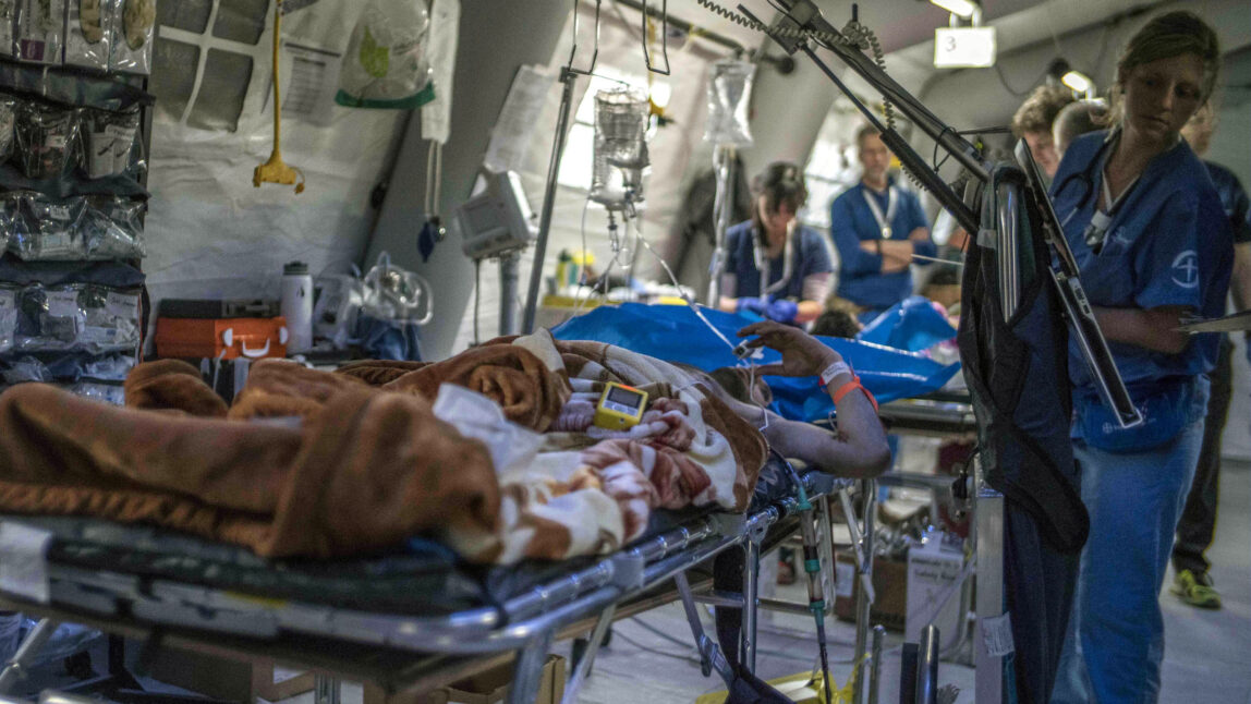 Medical volunteers attend to a civilian casualty of the battle to retake Mosul from Islamic State militants, at the the Samaritan’s Purse field hospital, in Bartella, Iraq, March 23, 2017. (AP/Tomislav Skaro)