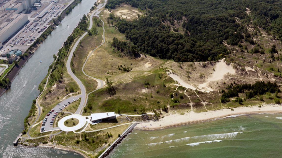An aerial view of the Indiana Dunes National Lakeshore in Portage, Indiana. U.S. Steel's facility can be seen in the upper left corner adjacent&nbsp;to the tributary to Lake Michigan. (Indiana Dunes National Lakeshore/Flickr)
