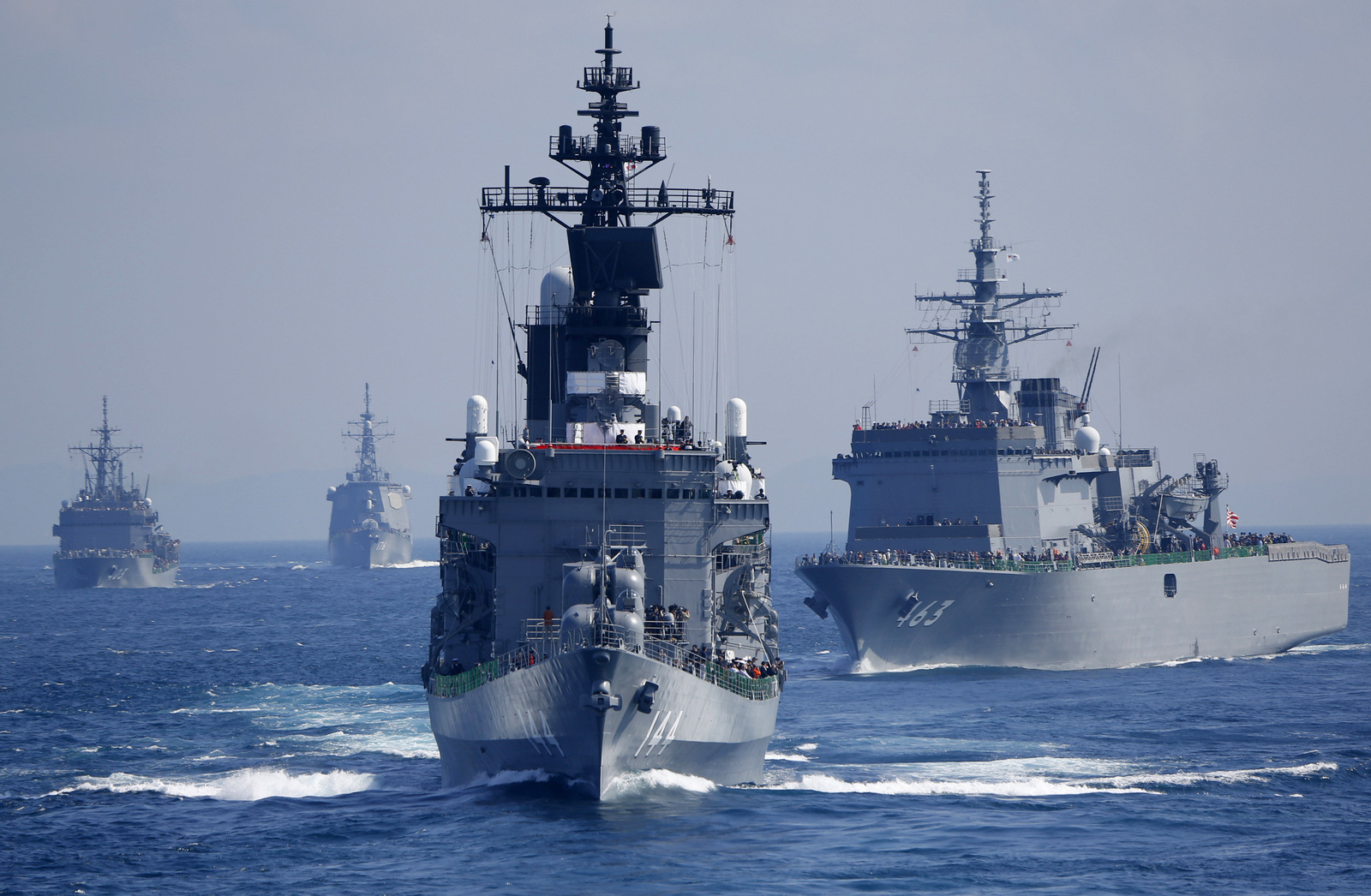 Japan Maritime Self-Defense Force (JMSDF) escort ship "Kurama" leads other vessels during a fleet review in the water off Sagami Bay, south of Tokyo. (AP/Shizuo Kambayashi)