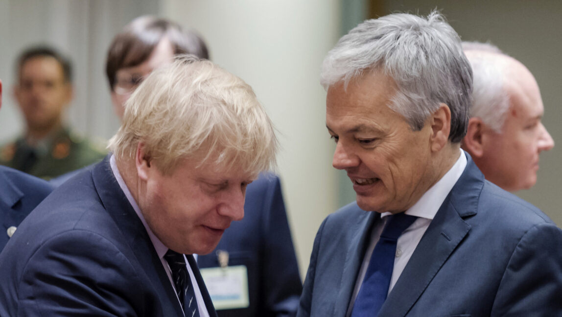 Britain's Foreign Secretary Boris Johnson, center, greets Belgium's Foreign Minister Didier Reynder. (AP/Geert Vanden Wijngaert)