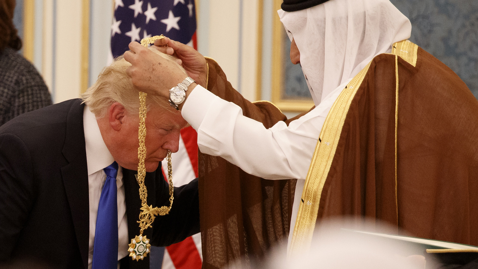 Saudi King Salman presents President Donald Trump with The Collar of Abdulaziz Al Saud Medal at the Royal Court Palace, Saturday, May 20, 2017, in Riyadh. (AP/Evan Vucci)