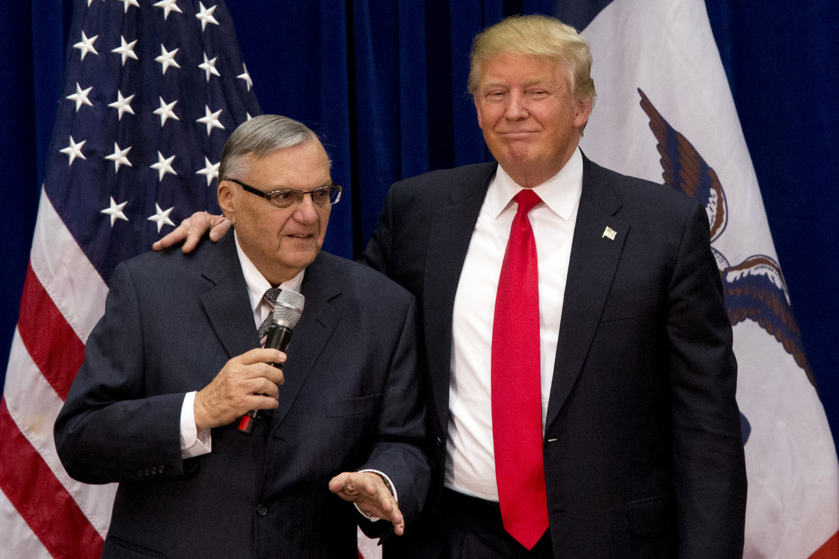 Then presidential candidate, Donald Trump, is joined by Maricopa County, Ariz., Sheriff Joe Arpaio at a campaign event in Marshalltown, Iowa. (AP/Mary Altaffer)