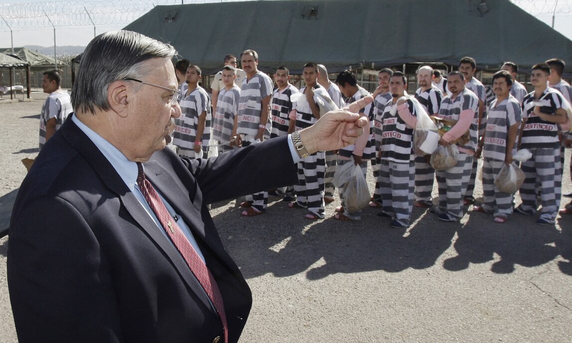 Joe Arpaio, who proclaimed himself ‘America’s toughest sheriff’, showing detainees at the Tent City facility to the media in 2009. (Photo: Ross D. Franklin/AP)