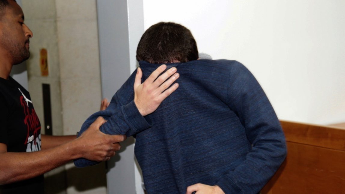The Israeli-American JCC bomb hoax suspect, Michael Kadar, at a hearing in Rishon Letzion Magistrate's Court, March 23, 2017. (Baz Ratner/Reuters)