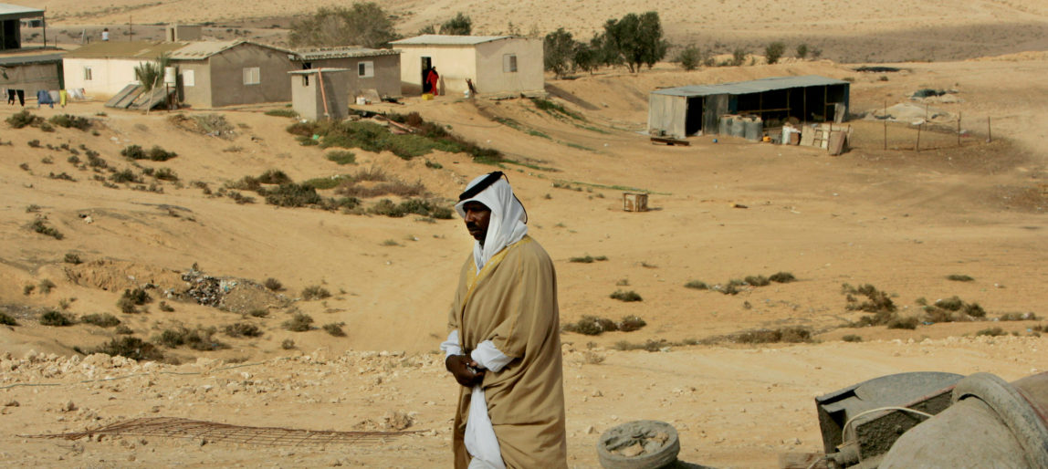 A Bedouin sheikh walks in the unrecognized village of Wadi El Naam, southern Israel, Thursday, Nov. 20, 2008. Israeli authorities were reportedly planning to destroy a mosque in the village because it was built without a permit, which Bedouins cannot obtain in their unrecognized communities. (AP/Tara Todras-Whitehill)