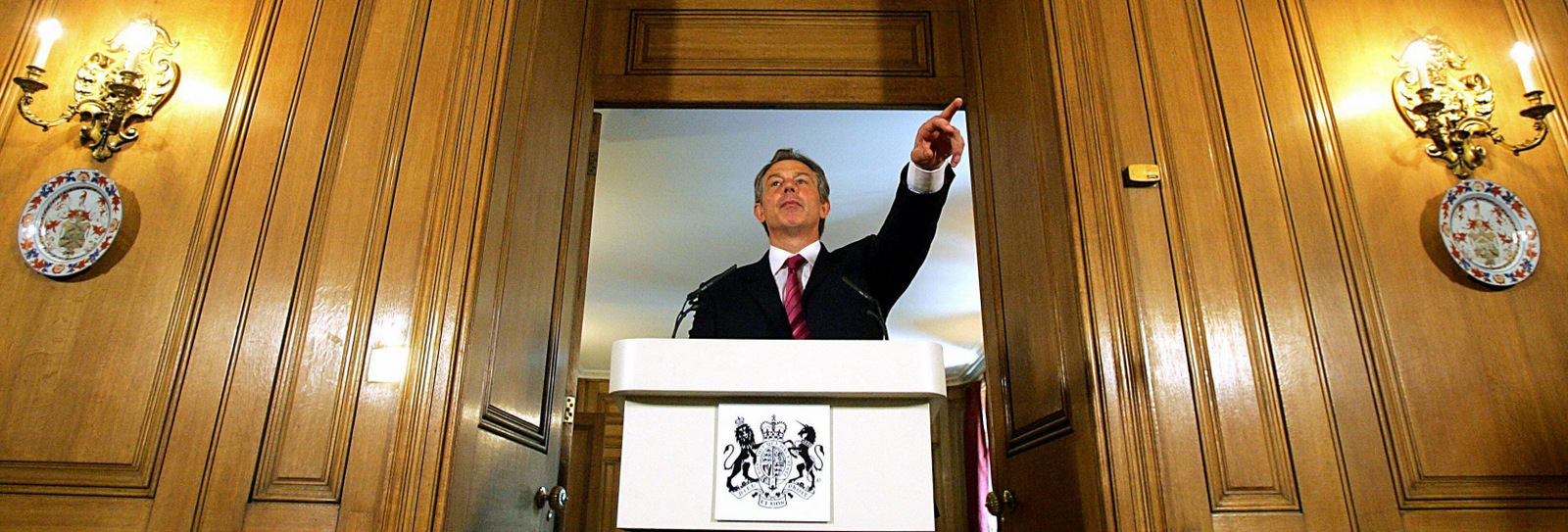 Britain's Prime Minister Tony Blair speaks to the media during his monthly press conference at 10 Downing street, in London, June 15 2004, where he insisted that he had been right to take military action against Iraq. (AP /Odd Andersen)