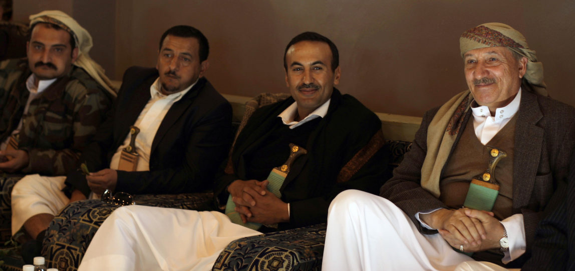 Ahmed Ali Saleh, center, the son of Yemeni President Ali Abdullah Saleh and the commander of the Republican Guard Forces, attends a mass-wedding ceremony for 320 grooms of his force in Sanaa, Yemen, Sunday, Jan. 1, 2012. (AP/Hani Mohammed)