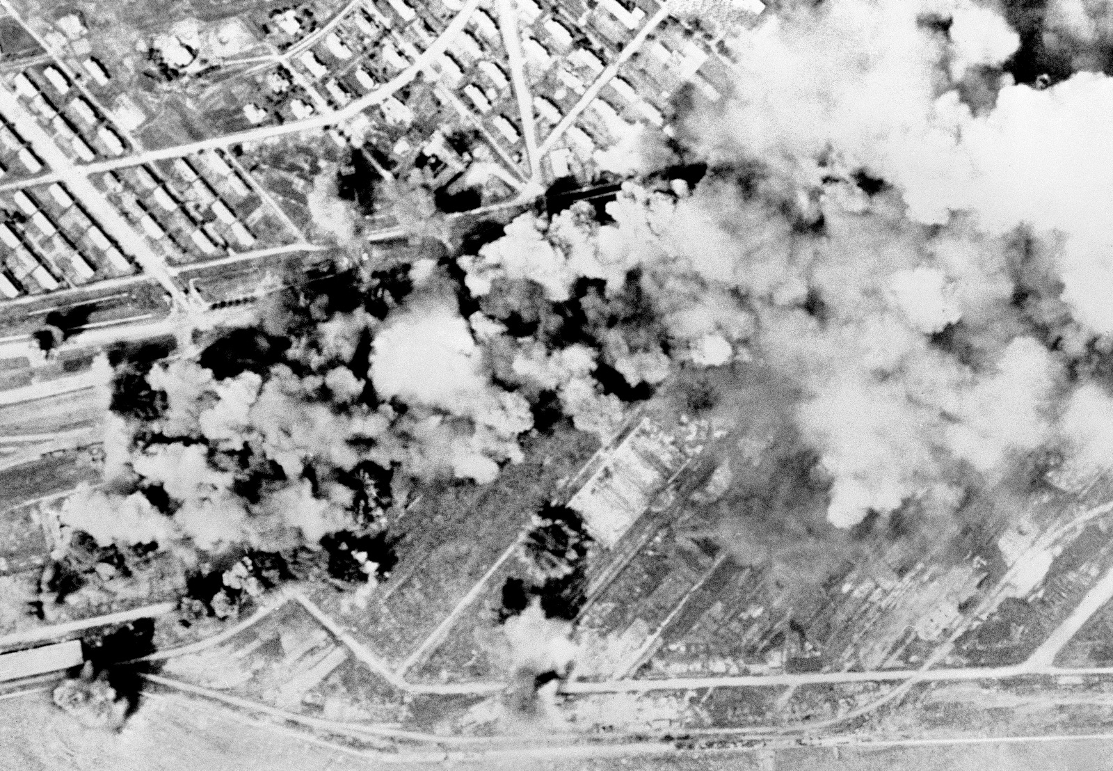 A North Korean rail yard at Rashin turned into a scene of boiling fury after B-29 Superforts dropped a heavy tonnage of high explosives, August 25, 1951. AP