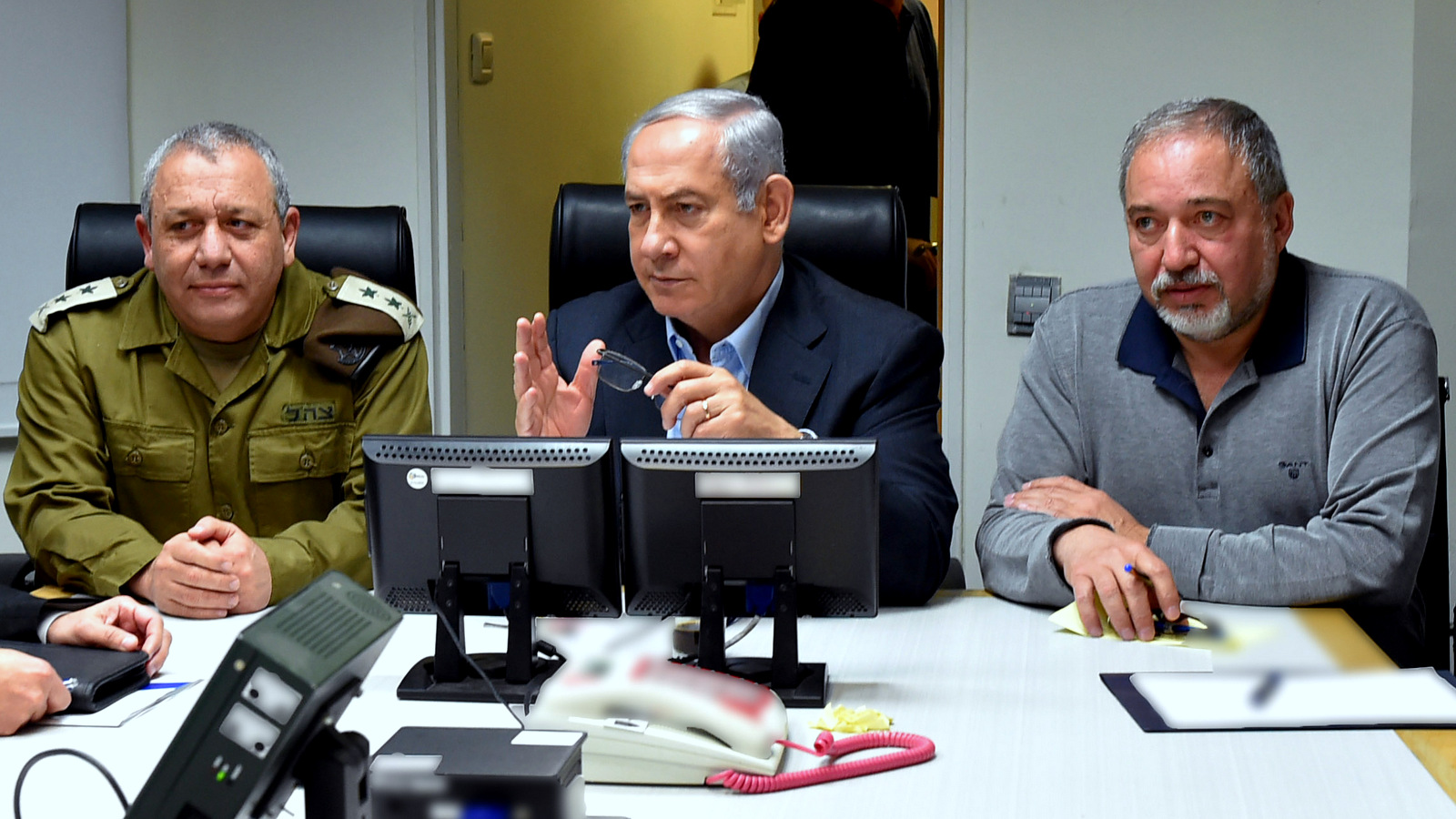 Israeli Prime Minister Benjamin Netanyahu (C), Defense Minister Avigdor Lieberman (R), and Chief of Staff Lieutenant-General Gadi Eizenkot meet in Tel Aviv, Israel February 10, 2018 in this handout photo released by the Israel Defence Ministry.