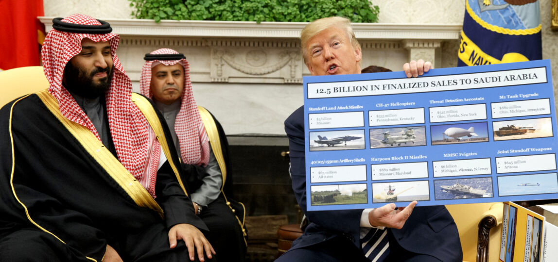 President Donald Trump shows a chart highlighting arms sales to Saudi Arabia during a meeting with Saudi Crown Prince Mohammed bin Salman in the Oval Office of the White House, Tuesday, March 20, 2018, in Washington. (AP/Evan Vucci)