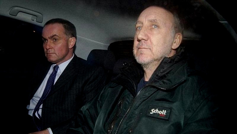 Rock guitarist Pete Townshend arrives at his house in Richmond, Surrey, Jan. 14, 2003. Townshend was released from police custody after his arrest on suspicion of possessing indecent images of children his lawyer said. (AP Photo)