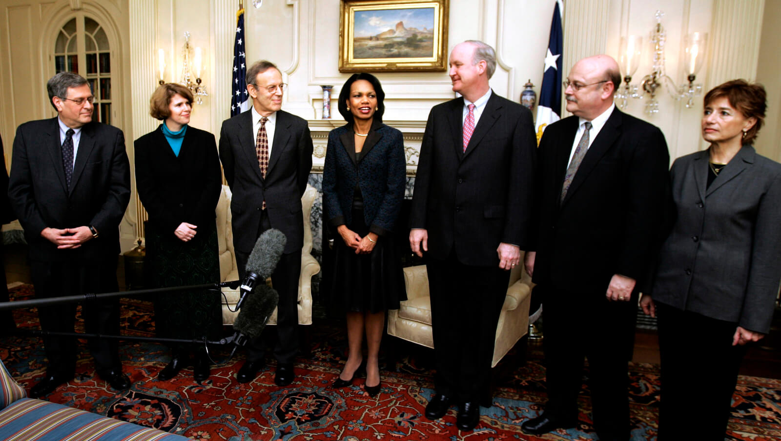 Condoleezza Rice, fourth from left, accompanied by participants from Non-governmental organizations, speaks to reporters at the State Department in Washington, Wednesday, Jan. 31, 2007. From left are, Ken Wollack, National Democratic Institute; Jennifer Windsor, Freedom House; Carl Gershman, National Endowment for Democracy; Rice; Lorne Craner, International Republican Institute; John Sullivan, Center for International Private Enterprise; and Ellie Larson, Solidarity Center. Manuel Balce Ceneta | AP