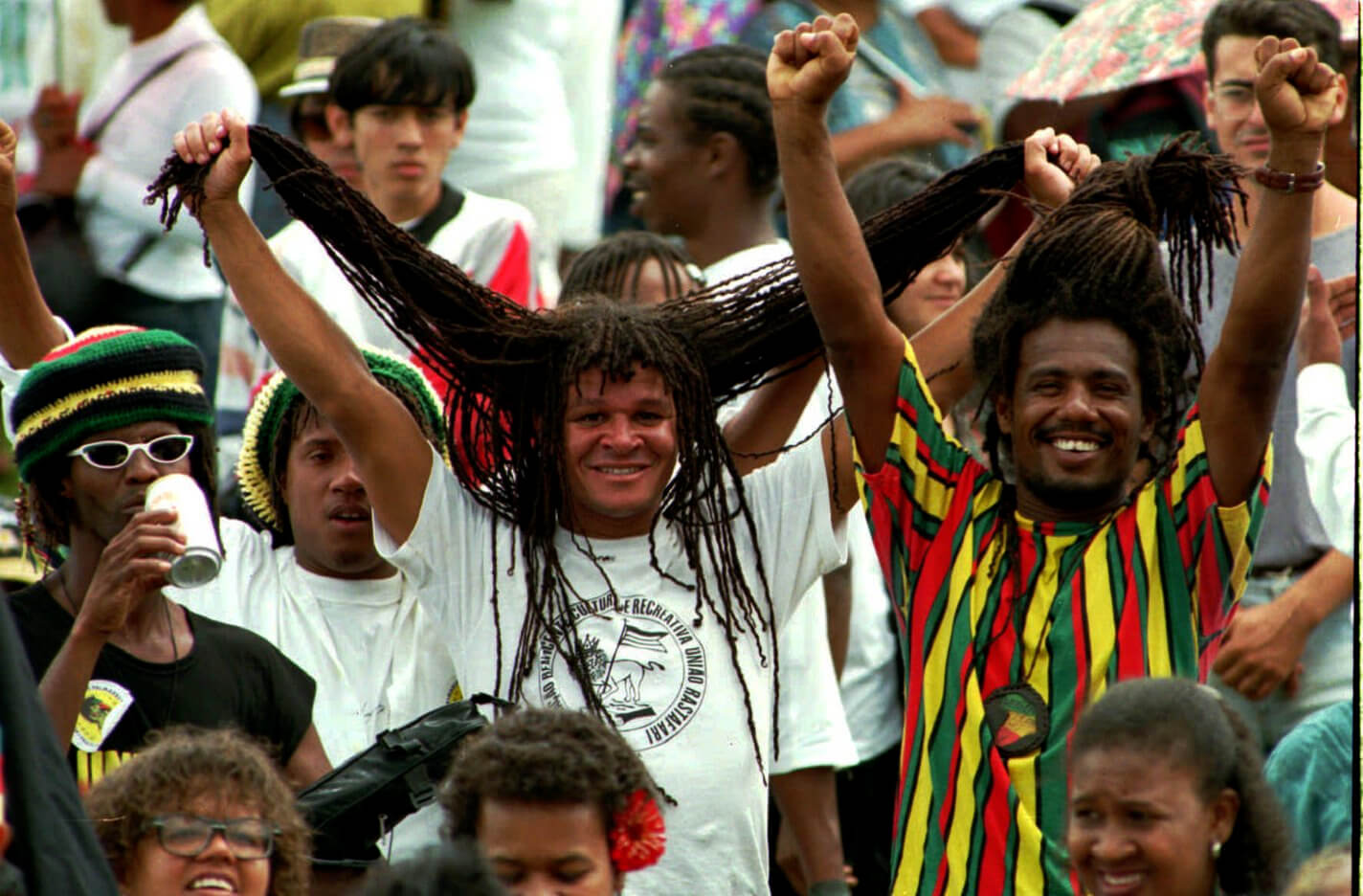 Human rights marchers participate in a march against racism, in Brasilia, Brazil, November 20, 1995. Thousands participated in the march against racism and oppression Monday in remembrance of the 300 years since the 17th century hero of the black movement in Brazil, "Zumbi de los Palmares' ,'" fight against oppression. Eraldo Peres | AP