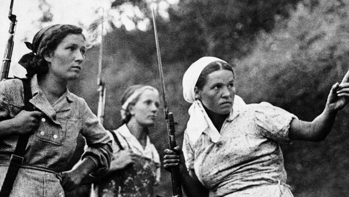 Soviet girls, collective farmers of a village somewhere in Russia, who joined Guerillas, are pictured on Sept. 19, 1941. British Official Photograph via AP