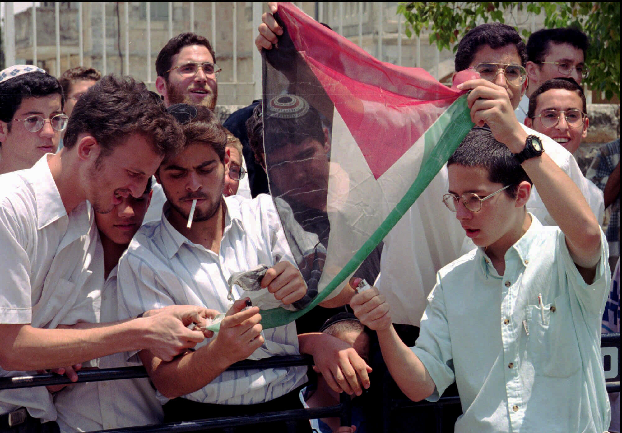 Israel Palestine flag burn
