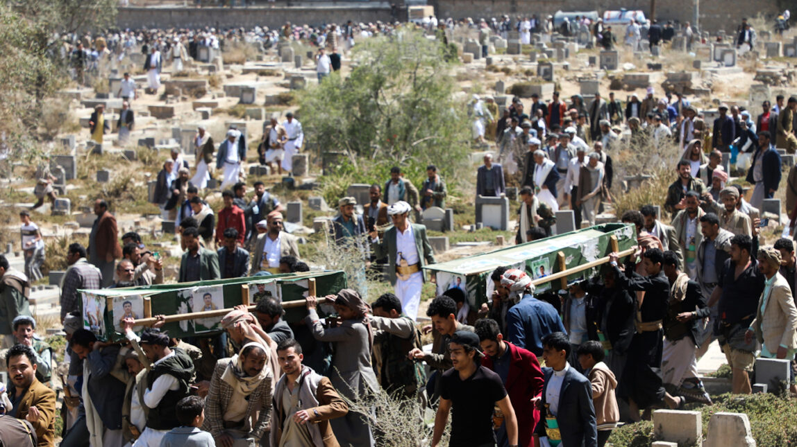 Yemenis gather at Al Mashhad cemetery in Sanaa to bury victims of U.S. airstrikes, April 23, 2025.