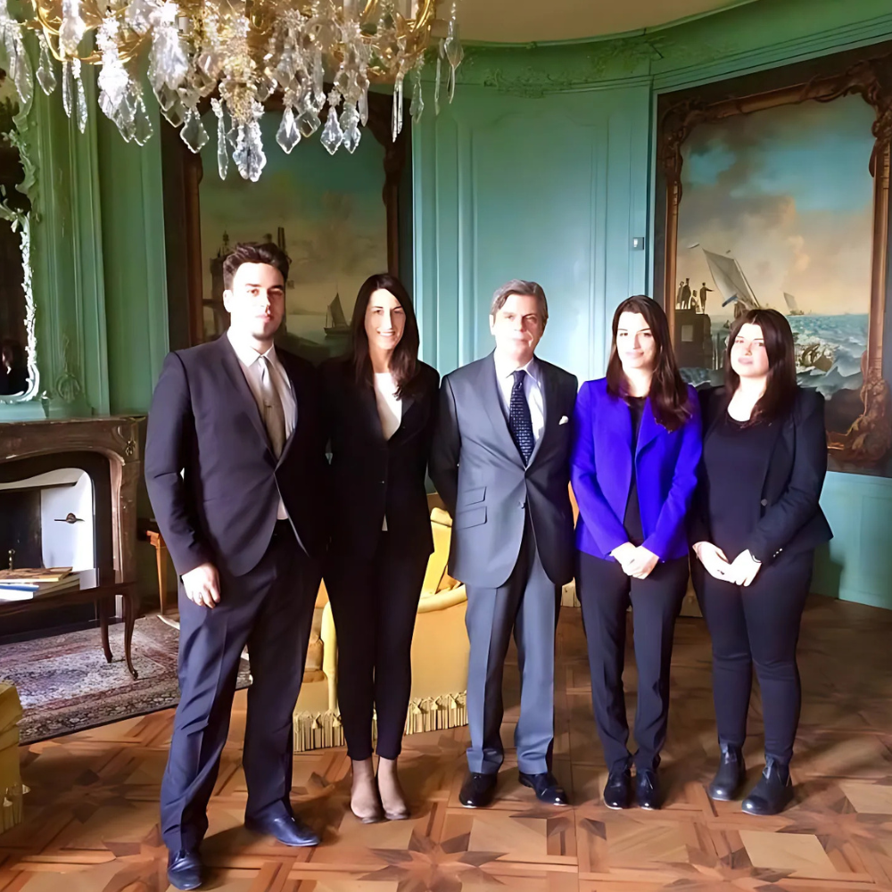 Group photo featuring Deborah Fiorin with diplomats