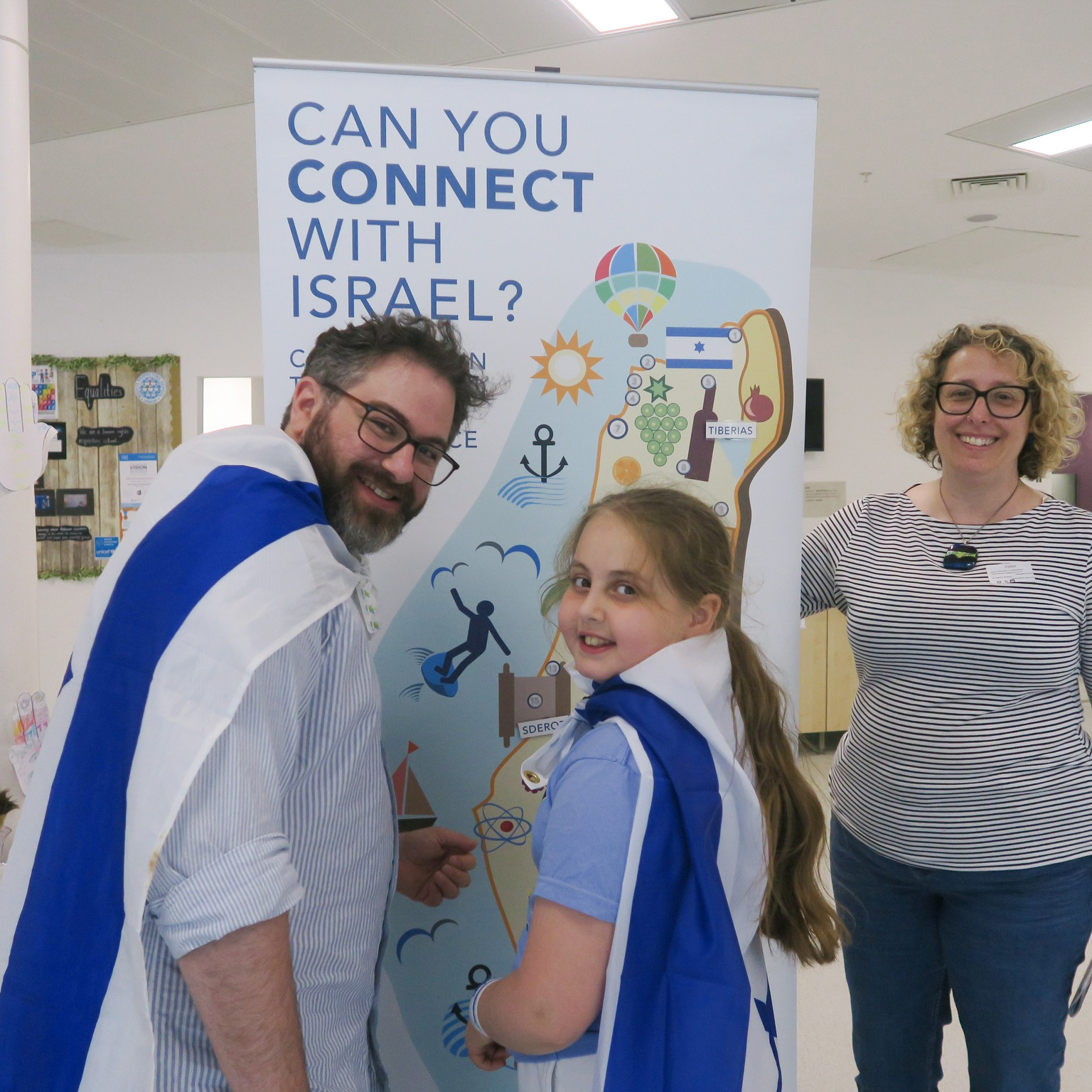 Celebrating the creation of the Zionist entity in Calderwood Primary School, 2025, with Shayna Conn (right) of the Scottish Jewish Youth Alliance