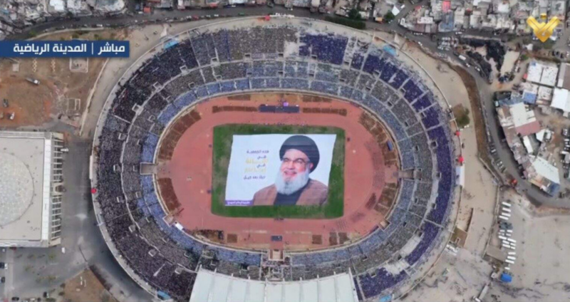 Aerial view of Camille Chamoun Stadium in Beirut filled with attendees at Hezbollah's "The Sayyed's Generations" event